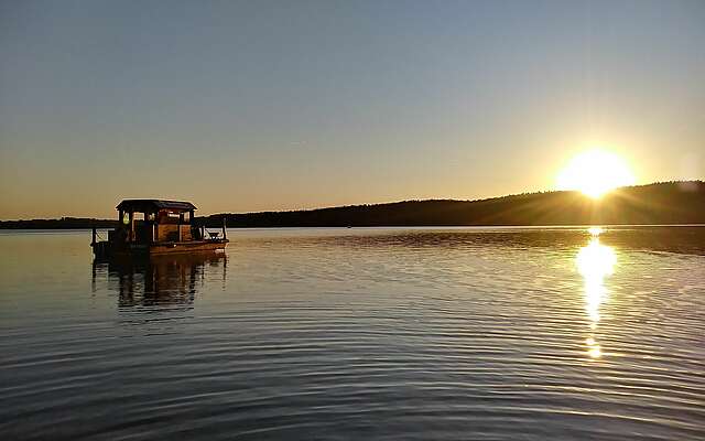 Huckleberry Floß im Sonnenuntergang